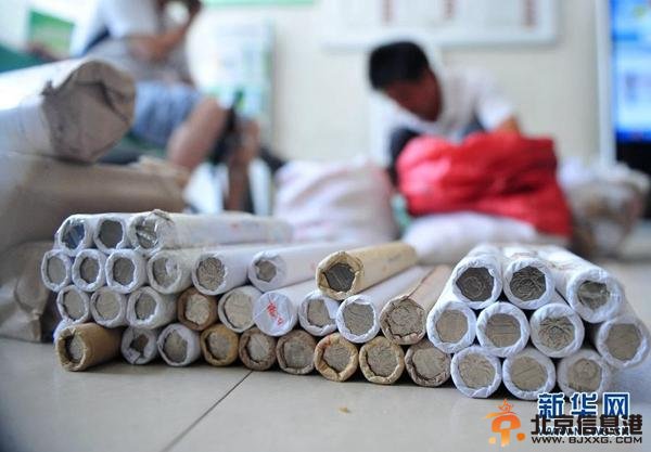 民工讨薪获300公斤硬币 清点1小时打两辆车运回