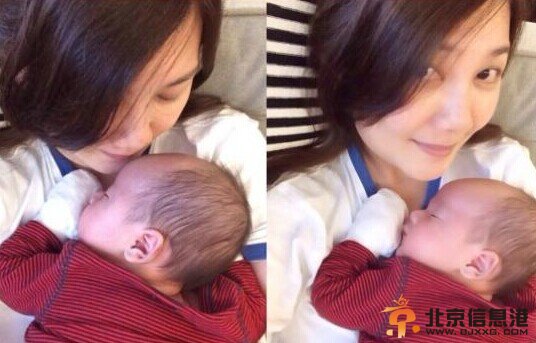 梁静茹抱熟睡儿子一脸幸福 唱摇篮曲宝贝乖乖