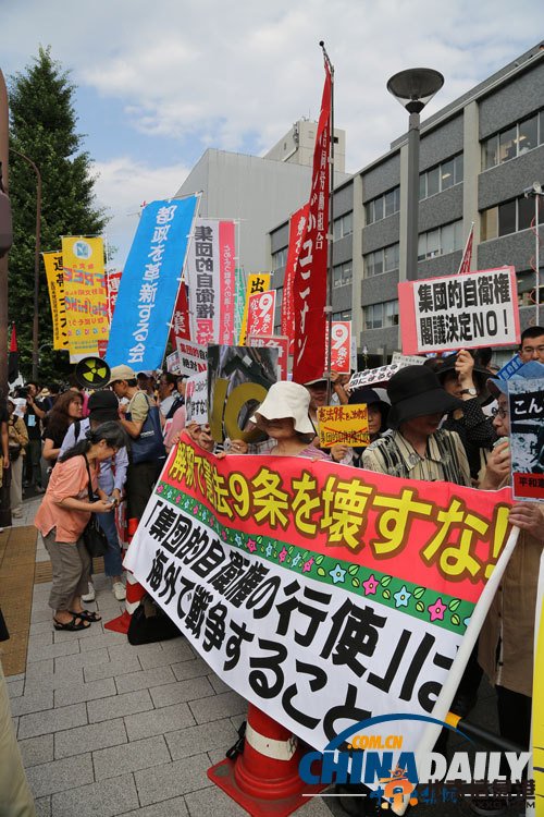 独家：日本民众抗议安倍允许行使集体自卫权（组图）