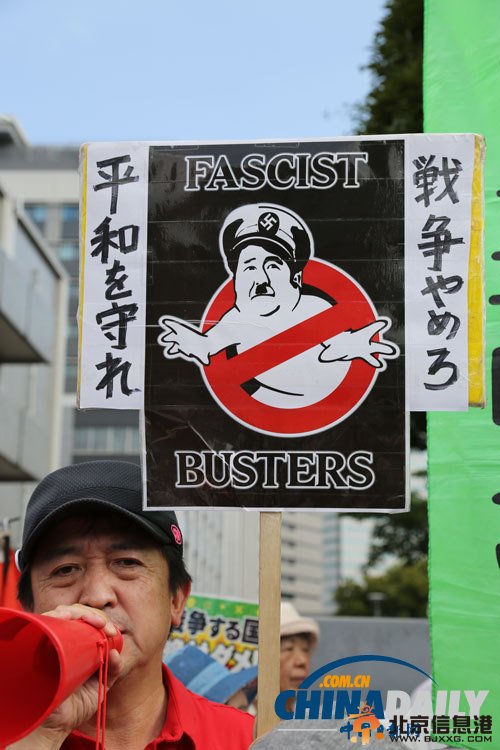 独家：日本民众抗议安倍允许行使集体自卫权（组图）