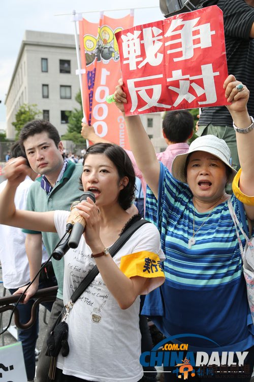 独家：日本民众抗议安倍允许行使集体自卫权（组图）