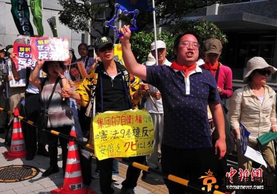 日本官房长官称须尽快完善集体自卫权相关法律
